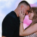 Travis Kelce and Taylor Swift embrace each other in a designed image with a blue and pink background.