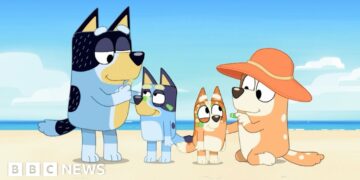 Bluey characters at a beach with Australian Indigenous face paint