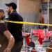 Syrian emergency services personnel work at the site a bomb blast at a cafe in central Damascus, Syria (2 July 2026)