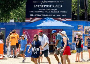 "Event Postponed" signage during the Great American State Fair on the National Mall in Washington, DC on Friday