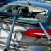 Metal pipes pierce car window