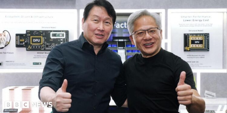 SK Hynix chairman Chey Tae-won and Nvidia boss Jensen Huang posing for a picture with their thumbs up