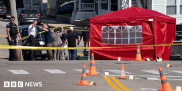 FBI agents investigate the scene in Biddeford, Maine where a man reportedly died after an encounter with immigration officials