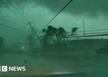 A power line is on the ground after a tornado.