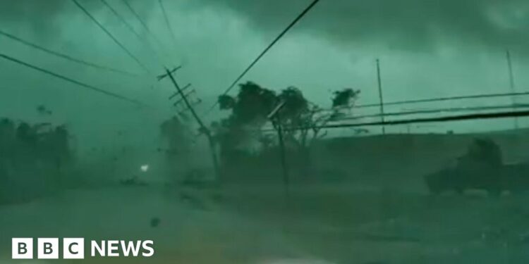 A power line is on the ground after a tornado.