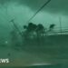 A power line is on the ground after a tornado.