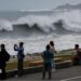 Residents observe huge waves brought by Typhoon Bavi in Hualien city, Taiwan