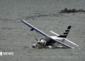 Emergency services on a boat respond to a crashed seaplane in the East River on 5 July 2026 in New York City.