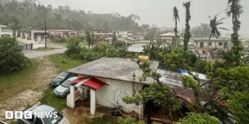 This picture shows a general view of a residential area as rain falls ahead of the arrival of the forecasted Super Typhoon Bavi in Saipan, Northern Mariana Islands, on July 5, 2026.