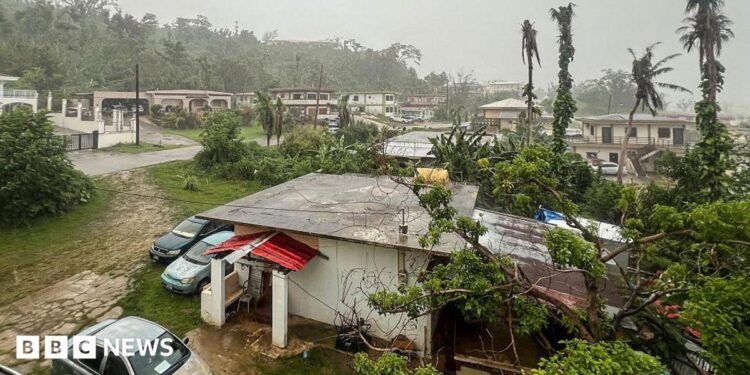 This picture shows a general view of a residential area as rain falls ahead of the arrival of the forecasted Super Typhoon Bavi in Saipan, Northern Mariana Islands, on July 5, 2026.