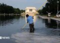 Workers clean the Lincoln Memorial Reflecting Pool on the National Mall on June 25, 2026 in Washington, DC.