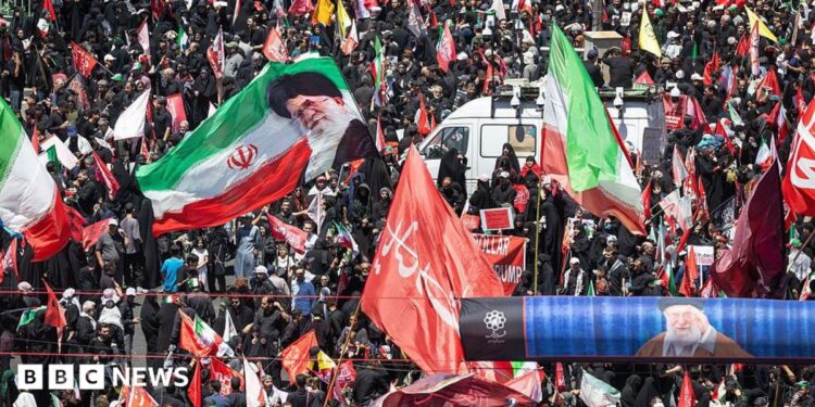 Thousands of mourners gather on a boulevard in Mashhad, northeastern Iran, ahead of the burial of Iran's late Supreme Leader Ayatollah Ali Khamenei (9 July 2026)
