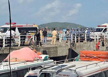 Ambulances line up on a pier to help victims after a tourist vessel capsized off Phu Quoc island in southern Vietnam. Photo: 11 July 2026