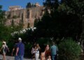 Tourists near the Acropolis in Athens, Greece