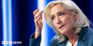 President of Rassemblement National parliamentary group Marine Le Pen poses poses ahead of a television interview entitled "Le Grand Entretien" broadcast on French news channel LCI, in Boulogne-Billancourt, southern of Paris on July 1, 2026