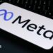 The Meta logo is displayed on a mobile phone