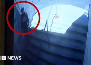 Tyler Robinsons is seen walking down some stairs.