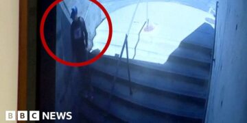 Tyler Robinsons is seen walking down some stairs.