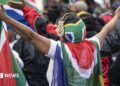 Protesters draped in South African flags in a rally against undocumented immigrants during a nationwide anti-immigration shutdown in Cape Town, South Africa, 30 June 2026.