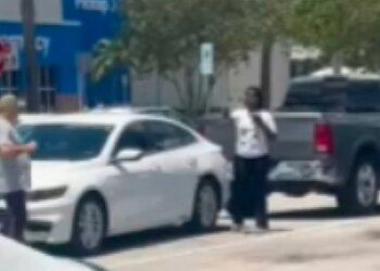 Bart Diguglielmo walks toward a woman holding what appears to be a cellphone in a Walmart parking lot before the fatal shooting in North Lauderdale, Florida.