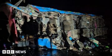 A wreckage of a bus from an accident
