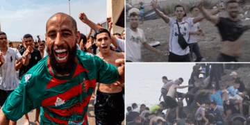 Migrants celebrate and cross into Spain