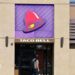 A person enters a Taco Bell restaurant on July 14, 2026 in Pasadena, California.
