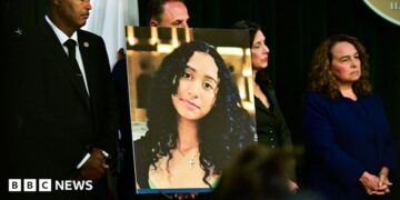 A portrait of the late Celeste Rivas Hernandez is shown during a press briefing by Los Angeles County District Attorney Nathan J. Hochman (out of frame) on the case against singer D4vd in Los Angeles, on April 20, 2026.