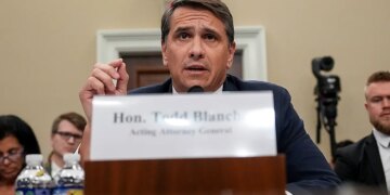Todd Blanche testifying during a House Committee on Appropriations subcommittee hearing inside a wood-paneled room.
