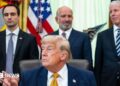 Michael Kratsios, director of the White House Office of Science and Technology Policy, from left, US President Donald Trump, Howard Lutnick, US commerce secretary, and Chris Wright, US energy secretary, during an executive order signing in the Oval Office of the White House in Washington, DC, US, on Monday, June 22, 2026.