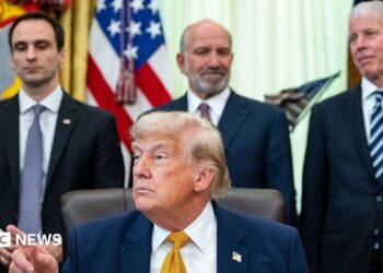 Michael Kratsios, director of the White House Office of Science and Technology Policy, from left, US President Donald Trump, Howard Lutnick, US commerce secretary, and Chris Wright, US energy secretary, during an executive order signing in the Oval Office of the White House in Washington, DC, US, on Monday, June 22, 2026.