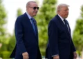 President Donald Trump poses with Turkish President Recep Tayyip Erdoğan ahead of the NATO summit.