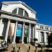 Smithsonian National Museum of American History building with large columns and tourists