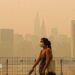 Smoke from massive wildfires in Canada engulfed the New York City skyline, reducing visibility and casting an orange haze over the New York City