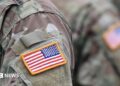 A USA patch flag on the US military uniform