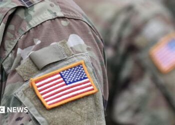 A USA patch flag on the US military uniform