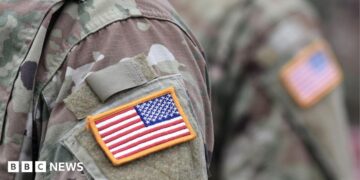 A USA patch flag on the US military uniform