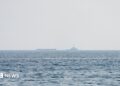 Vessels float in the Strait of Hormuz.
