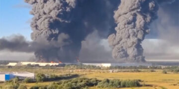 Smoke billows from a warehouse, after deadly Ukrainian drone attacks, as per regional governors, in Elektrostal