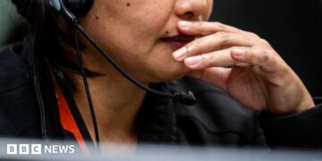 Call centre workers waiting for the bus after their shift