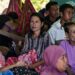 Villagers rest in a tent in an open field in East Nusa Tenggara