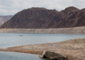 A World War II-era Higgins landing craft rests on the exposed shoreline at Lake Mead National Recreation Area