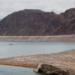 A World War II-era Higgins landing craft rests on the exposed shoreline at Lake Mead National Recreation Area