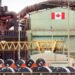 A Canadian flag visible on the ArcelorMittal Dofasco steel plant in Hamilton.