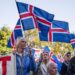 Supporters of the 'No' campaign wave Icelandic flags during a rally against reopening Iceland's European Union accession negotiations in Reykjavik, Iceland, on August 27, 2026