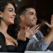 Ronaldo and his partner clap and smile in Dubai in 2014