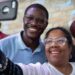 David Crowley poses for a selfie alongside a supporter while campaigning to be the Democratic candidate for Wisconsin governor