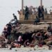 migrants swimming into Ceuta