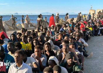 Red Cross personnel prepare food donations for migrants in Ceuta, Spain, 03 August 2026.