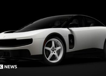 A white, custom version of the electric Ferrari Luce sold during a Sotheby's auction.